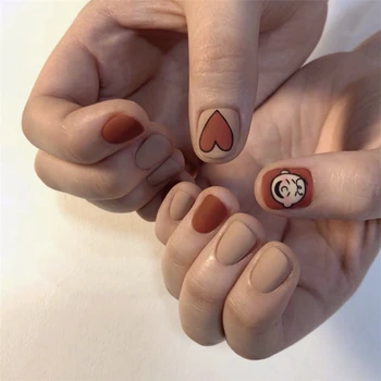  Матово оранжево хит чист цвят с анимационни шарките на въздушната ноктите Японски сладки къси режийни ноктите 24 бр. женски пълни с върховете на ноктите